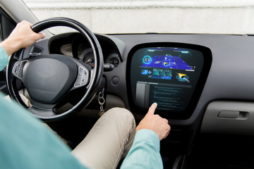 Naklejka premium close up of man driving car with navigation system