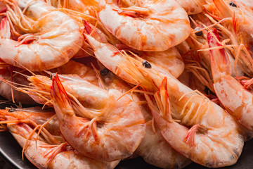 shrimp boil on wooden table.