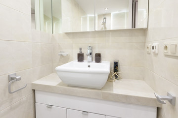 Fototapeta na wymiar bathroom with sink in a modern apartment