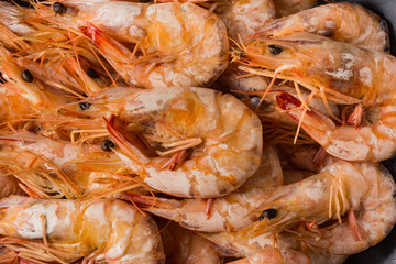 shrimp boil on wooden table.