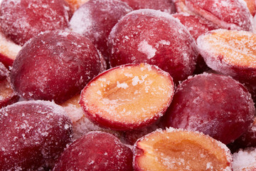 Frozen red plums