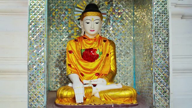 4k video - Beautiful statue in a Buddhist temple. Myanmar, Yangon
