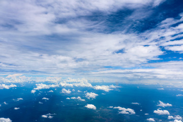 Sky and cloud view from window of airplane.