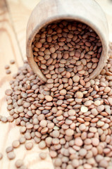 Lentils in a wooden cup