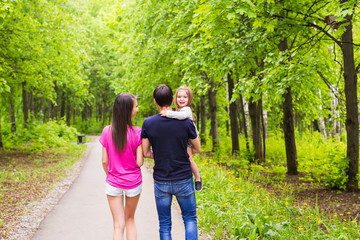 Fototapeta premium Happy family having fun outdoors and smiling
