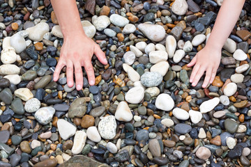 two hands in an embrace hearts