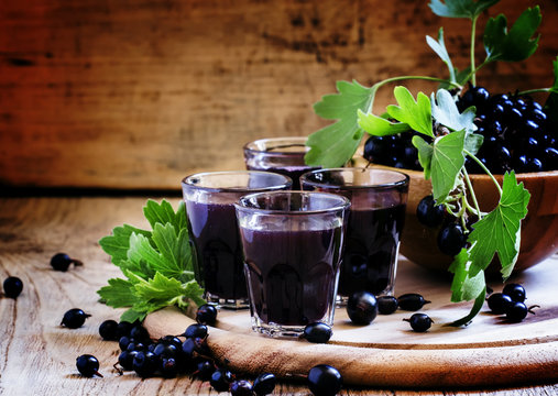 Homemade liqueur made from black currants and fresh berries, vin