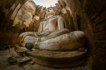 Ancient buddha statue. (Phra Achana, Wat Si Chum) Si Chum temple