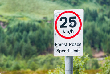 forest road speed limit sign