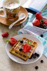 Traditional Belgian waffles with cream whipped cream and fresh b