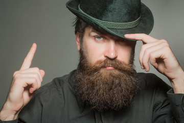 bearded gentleman in black retro hat