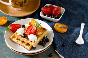 Traditional Belgian waffles with cream whipped cream and fresh b
