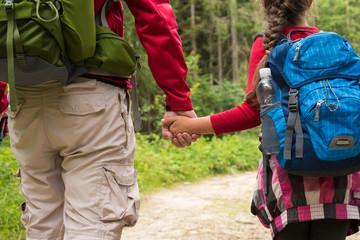 Father and doughter in mountains