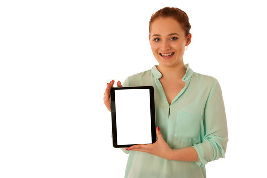 Business woman brousing the web on a tablet isolated over white