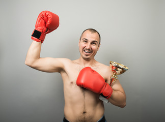 man with cup boxer