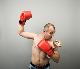 man with cup boxer
