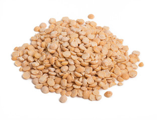 a handful of dried peas halves on a white background