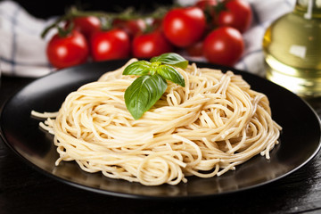Spaghetti bolognese on dark background