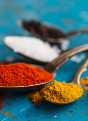 Wooden table of colorful spices