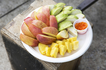 Apple,pineapple and guava in plate