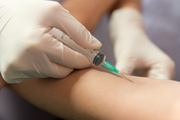 Needle and syringe in an elbow