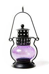 Purple glass vintage lamp on background