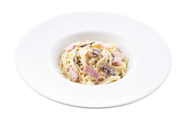 Carbonara spaghetti in plate on background