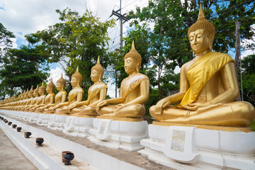 Golden Buddha statue in public temple Thailand
