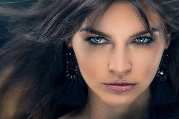 Beauty portrait of brunette elegant woman.