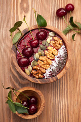 smoothie  with cherry, chia seeds, flax seeds and pumpkin seeds