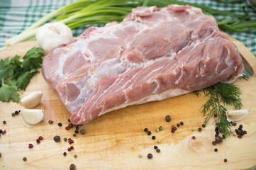 cut of pork with parsley, pepper and garlic