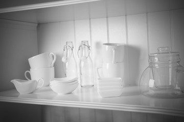 Dishes in cupboard in the kitchen