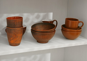 Dishes in cupboard in the kitchen