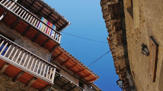 The old houses with balconies in the village of Rupit. The famous landmark of Catalonia and Spain.