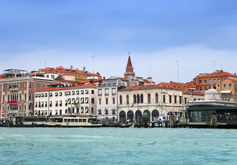 Fototapeta na wymiar Venice. Italy. Bright ancient houses along Canal Grande..