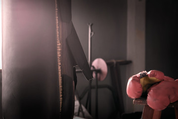 Punching bag / View of old and damage of punching bag. Vintage style.