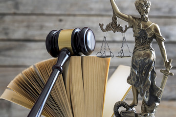 Law concept. Gavel, statue and book
