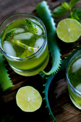 Aloe vera and lime cocktail with mint and ice cubes