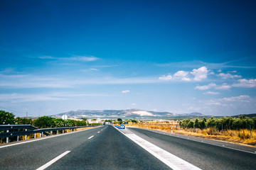 Beautiful empty asphalt freeway, motorway, highway in Andalusia,