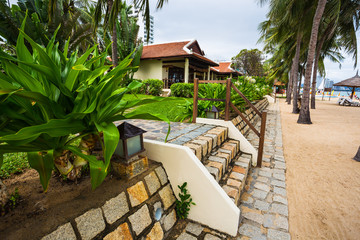 guest houses among palm trees, Vietnam