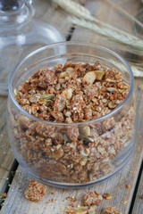 Granola, berries and ears of wheat and oats