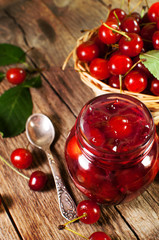 cherry jam on a wooden background