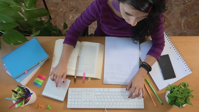 Female college student typing keyboard and snorting bored. Caucasian girl writing on computer and deleting annoyed. Studying for degree. Young people, university life and learning