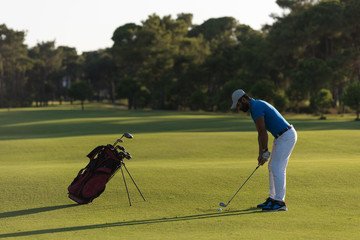 golfer hitting long shot