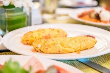 omelet on white plate on table