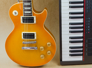 Electric guitar and keyboard musical close-up isoled