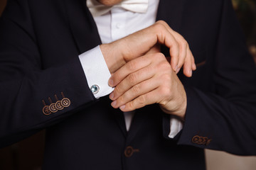 Businessman hands with cufflinks. Elegant gentleman clother