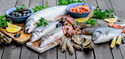 Fresh seafood on a wooden table.