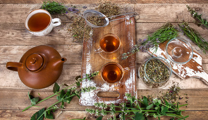 Obraz na płótnie Canvas Herbal tea on a rustic background.