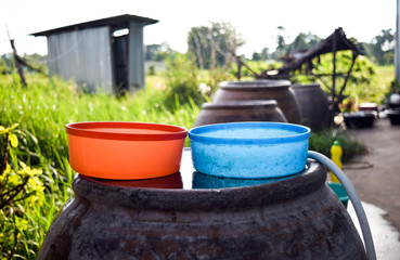 big water jar with color water bowl